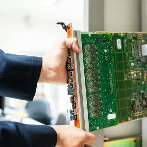 Engineer fixing core swith in data center room